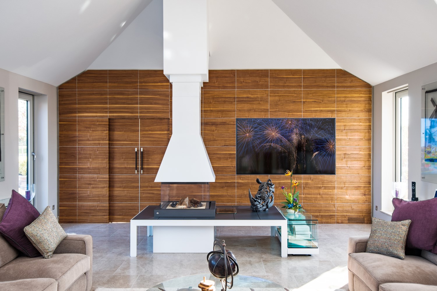 Front-on view of cinema room with TV in view.